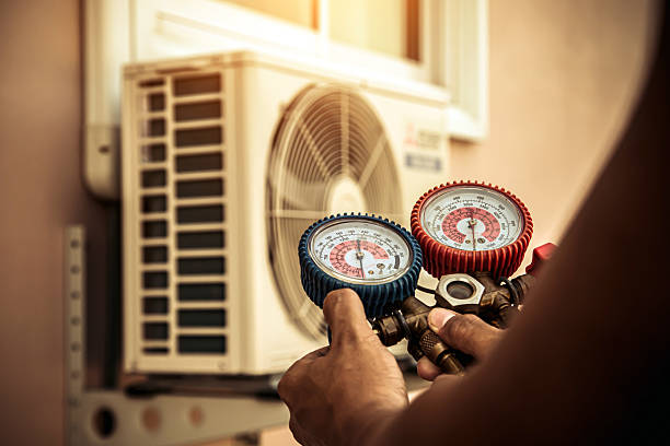 Professional Ac Repair technician working in Outlook, WA
